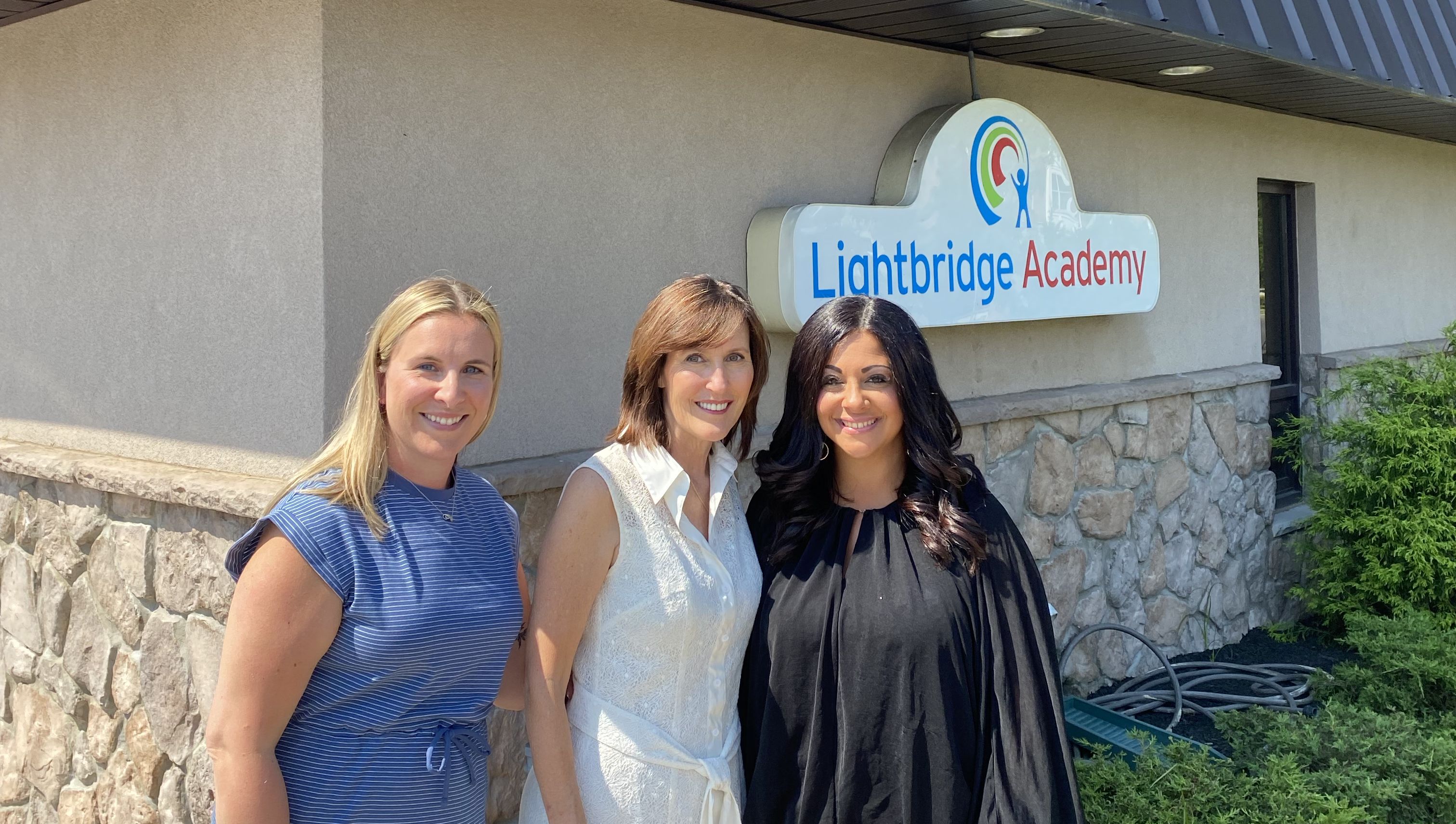 Lightbridge Academy Director for Cranford, Amanda Jennings (on left) poses with Assemblywoman Matsikoudis (center) and Jacylyn Falzarano, a ECEA board member.